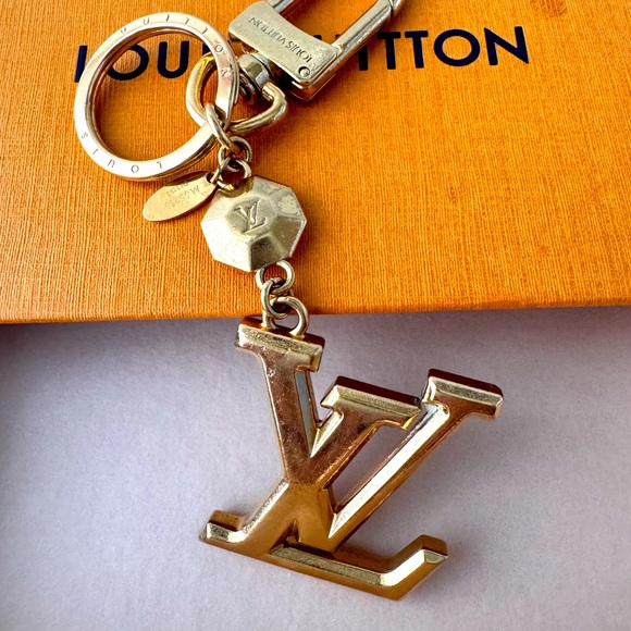 Louis Vuitton Accessories - Louis SOLD. Vuitton Gold Key & Card Holder Accessory. Made in Italy